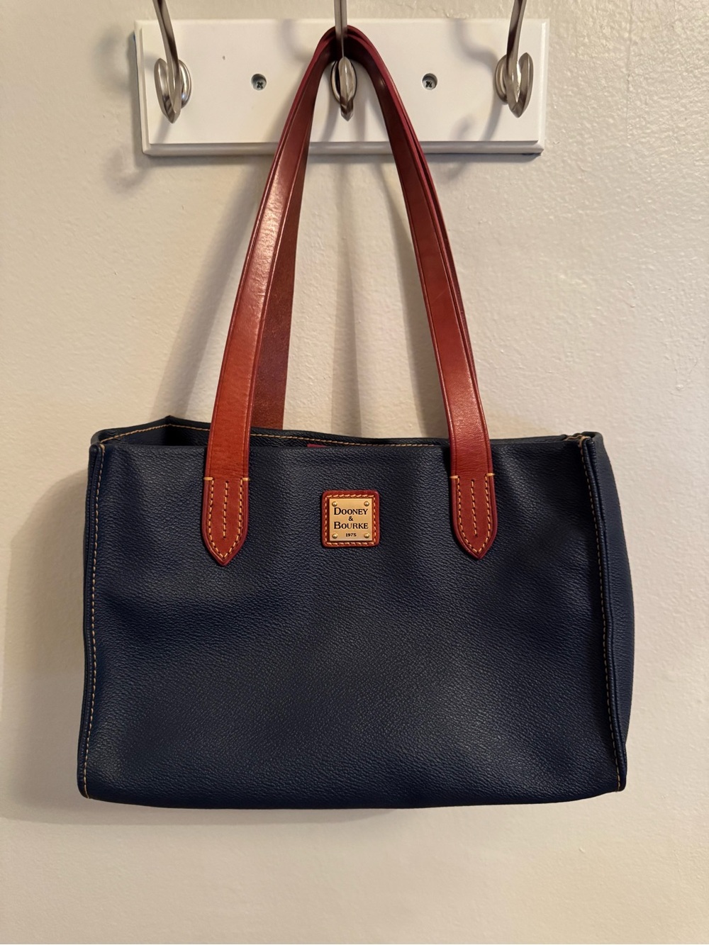 Dooney & Bourke Pebbled Leather Navy Tote with Brown Leather Handles- like new